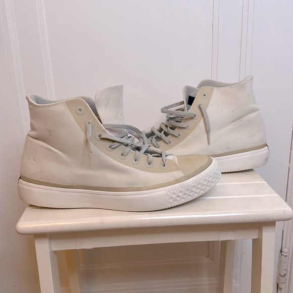 shoes feature minimalist aesthetic with, premium materials and subtle branding. - Picture 1 of 5